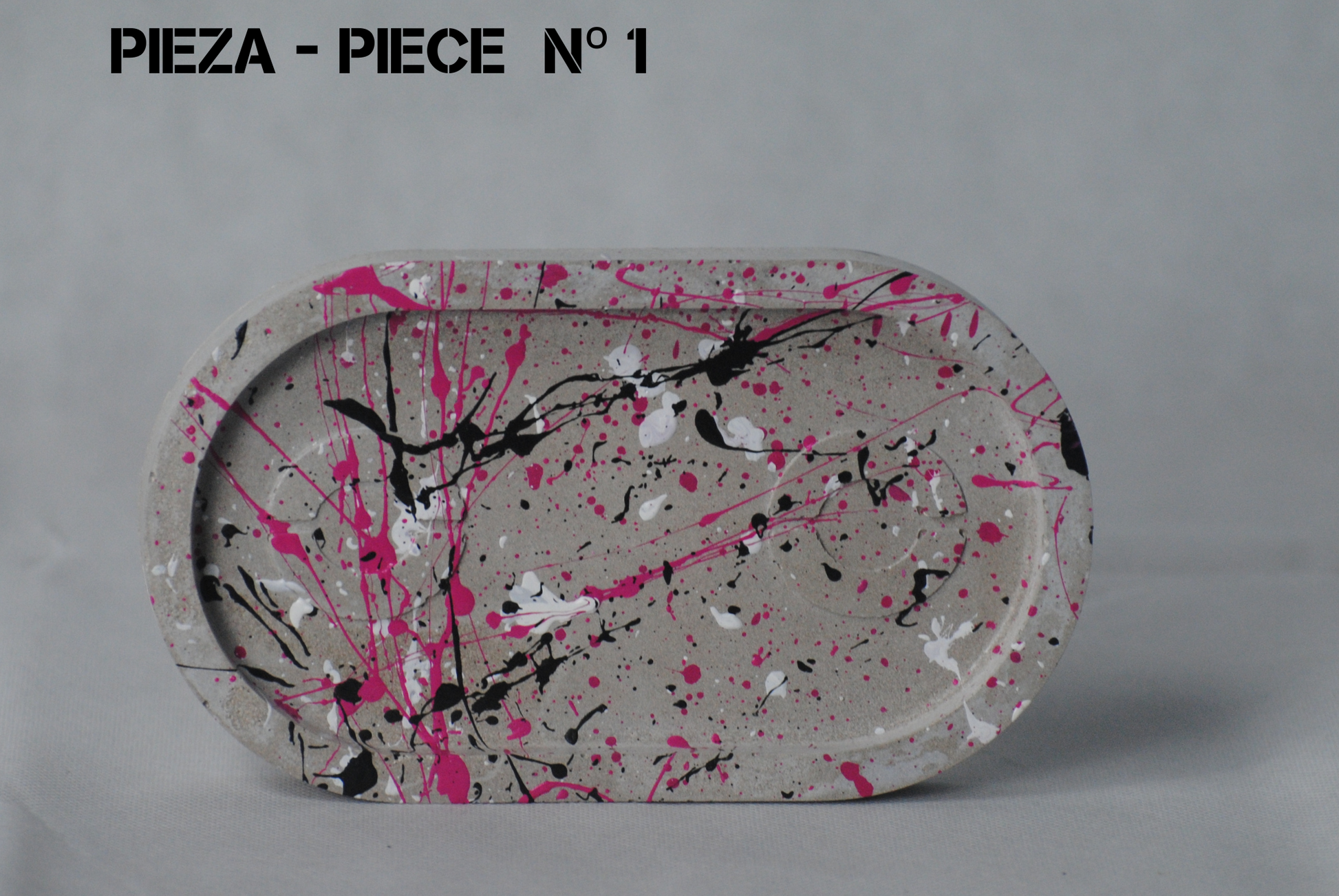 arisco® tienda de Productos de Decoración hechos en cemento. Plato Largo de Cemento. Colección Splash. Marca arisco® Splash Pink Pieza 1